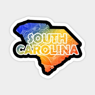 Colorful mandala art map of South Carolina with text in blue, yellow, and red Magnet