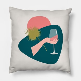 Hand with a glass of rose wine and leaf Pillow