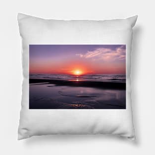 Orange and blue sunset on a beach Pillow