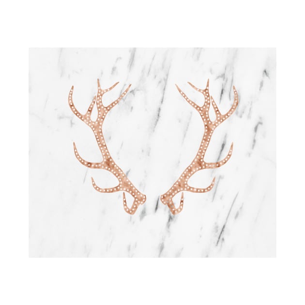 Rose gold antlers on soft white marble by marbleco