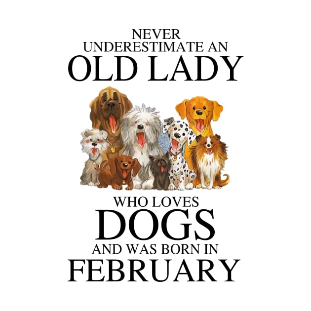 Never Underestimate An Old Lady Who Loves Dogs And Was Born In February by louismcfarland