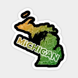 Colorful mandala art map of Michigan with text in green and orange Magnet