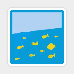 A school of yellow fish swimming in the blue sea Magnet