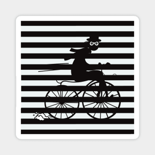 Black and white striped pattern with a shady cyclist running fast on an old bicycle Magnet