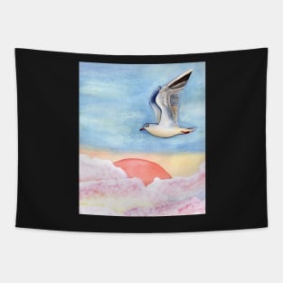 Seagull flying over pastel clouds Tapestry