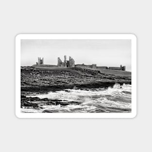 Waves along the rocky coast near Dunstanburgh Castle, Northumberland, UK Magnet