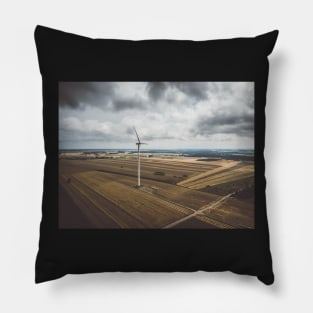 Aerial view of windmill against cloudy sky Pillow