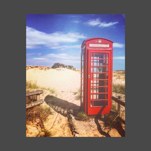 Red phone box on the beach by Lionik09