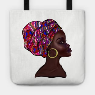 Afro queen With pink Kinte headwrap- Mahagony brown skin girl with thick glorious, curly Afro Hair and gold hoop earrings Tote