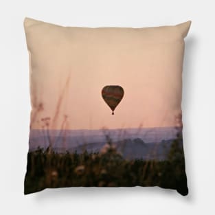 Hot Air Balloon flying during a warm summer evening over Yorkshire Pillow