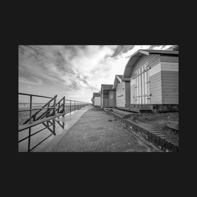 Traditional wooden beach huts on the Norfolk coast by yackers1