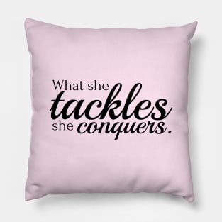 What she tackles she conquers Pillow