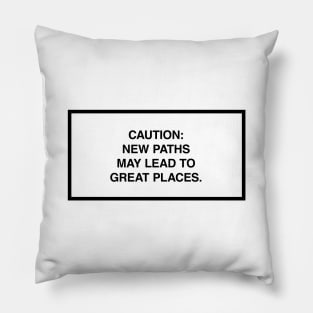 Caution: New paths may lead to great places. Pillow