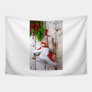 Ice Skates Hanging On White Wall Tapestry