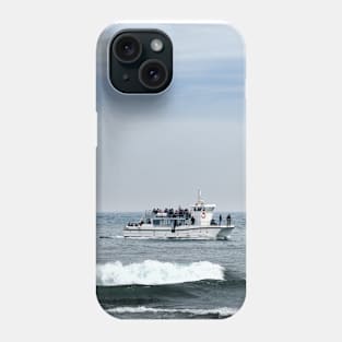 Tour boat returning from the Farne Islands to harbour, Northumberland, UK Phone Case