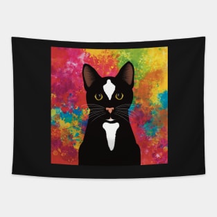 The cute and alert black and white tuxedo cat is waiting and watching you , colorful  background Tapestry