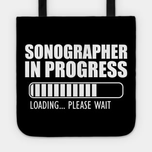 Sonographer in progress loading w Tote