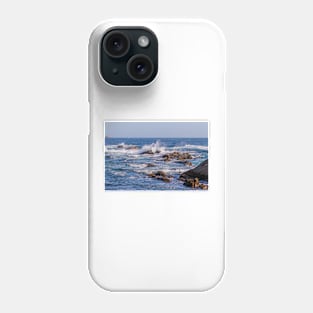 Crashing waves splash into the rocky coastline of California Phone Case