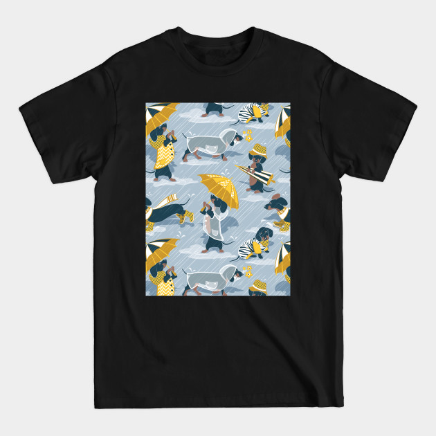 Disover Ready For a Rainy Walk // pattern // pastel blue background dachshunds dogs with yellow and transparent rain coats - Dachshund Dog - T-Shirt
