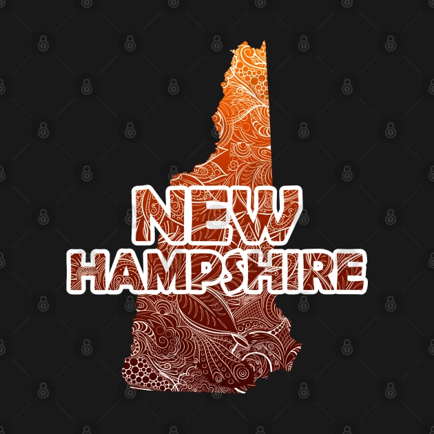 Colorful mandala art map of New Hampshire with text in brown and orange by Happy Citizen