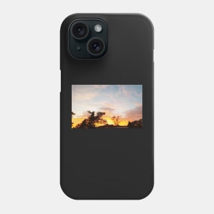 sunset over the trees Phone Case
