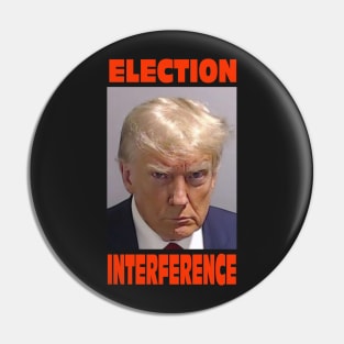 Trump mugshot with famous text "Election Interference". Pin