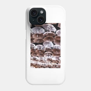 The beauty of white umbrellas illuminated by Christmas lights decorating the streets of Agueda Portugal Phone Case