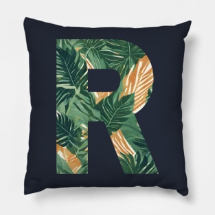 A pattern of vintage tropical leaves filling the letter R Pillow