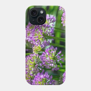 Light purple Allium flowers in a garden Phone Case