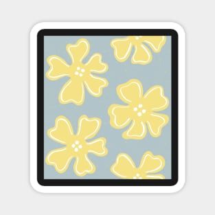 Pattern of yellow button flowers on light blue Magnet