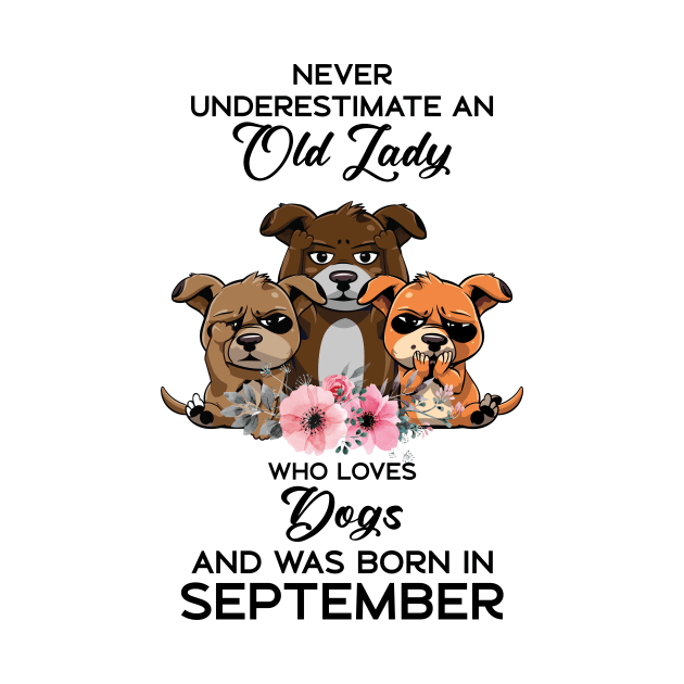 Never Underestimate An Old Woman Who Loves Dogs And Was Born In September by Happy Solstice
