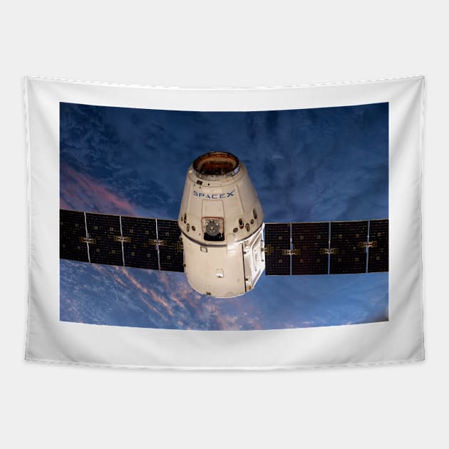 SpaceX Dragon capsule at the ISS, 2014 (C022/8058) Tapestry by SciencePhoto