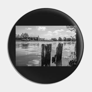 Wooden mooring posts on the River Bure in Horning, Norfolk Pin