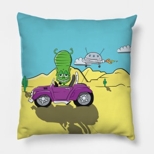 Alien driving a Purple Car in the Desert Landscape with UFO Pillow