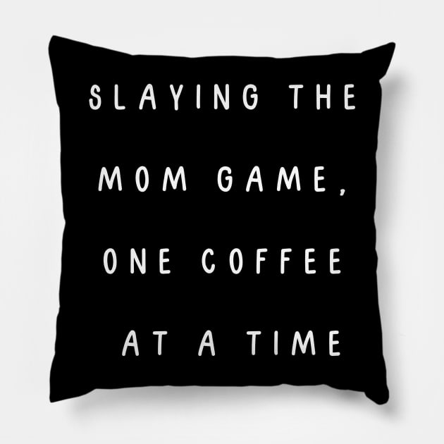 Slaying the mom game, one coffee at a time. Pillow by Project Charlie