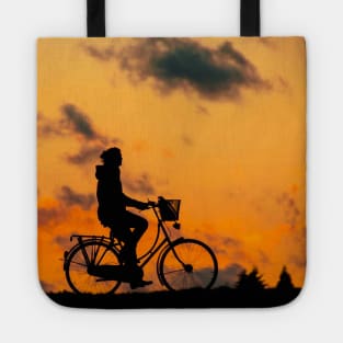 biking in the sunset Tote