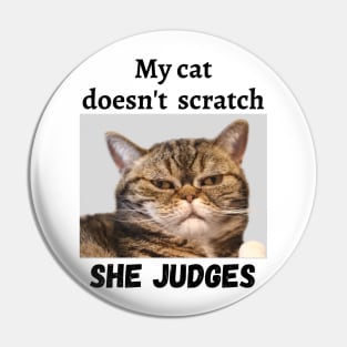 My cat doesn't scratch she Judges Pin