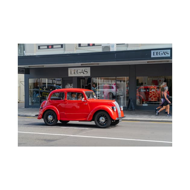 Red Morris 8 car in deco city of Napier New Zealand. by brians101