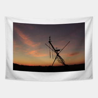 Kansas colorful Sunset with an Irrigation System Silhouette with cloud's. Tapestry