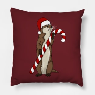 Christmas otter holding a candy cane Pillow
