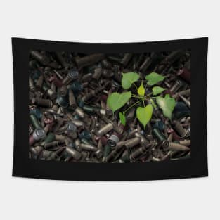 Gun Violence Hope Concept as gun shells with a green sapling growing as inspirational surreal art Tapestry