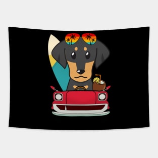 Surfer dachshund driving to the beach Tapestry