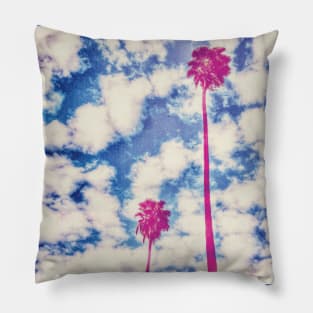 Pink Palm Trees Against a Cloudy Blue Sky Pillow