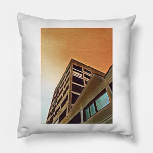 Jagged apartment block at dusk Pillow