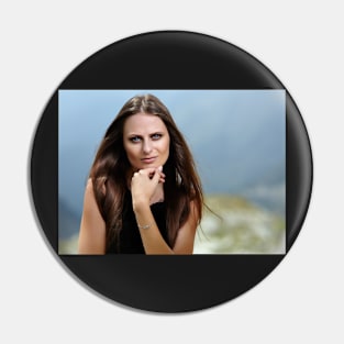 Beautiful woman in a mountain landscape Pin