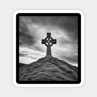 Ancient Stone Celtic Cross on a hill with the Sun shining through the cross in black and white. Magnet