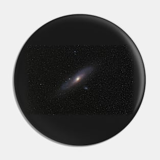 Andromeda Galaxy against starry sky Pin