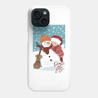 Cute wintery landscape with a Child making a snowman out in the snow Phone Case