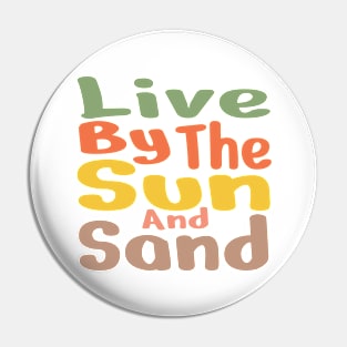 Live by the Sun and sand. T-Shirt and other product. Pin