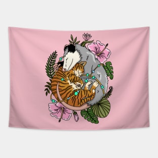 Cat and opossum sleeping in tropical plants and flowers Tapestry